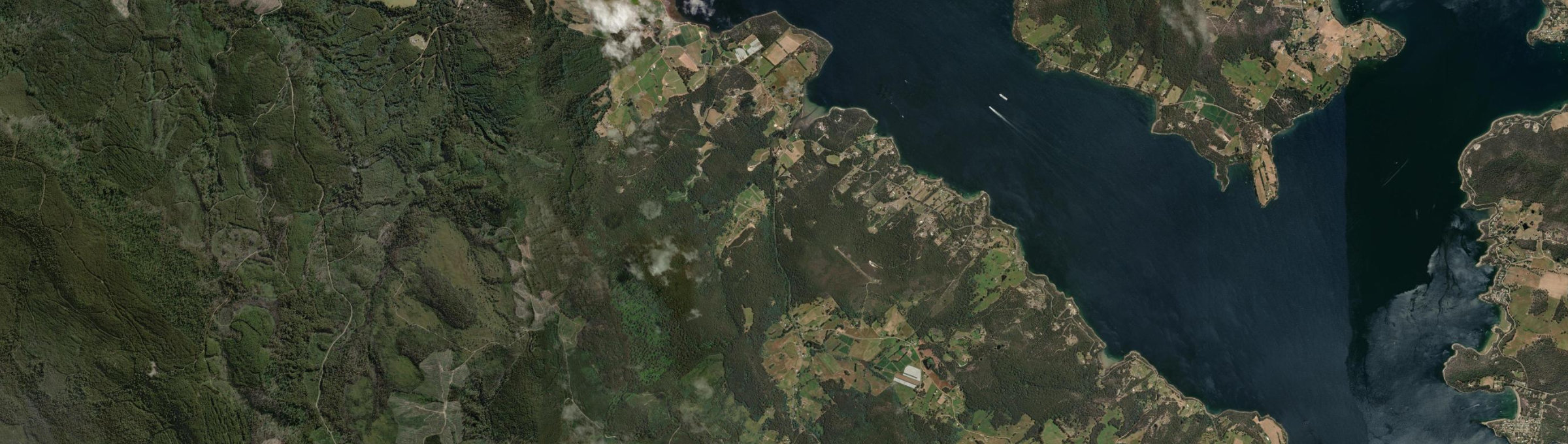 Aerial view of Surges Bay, TAS