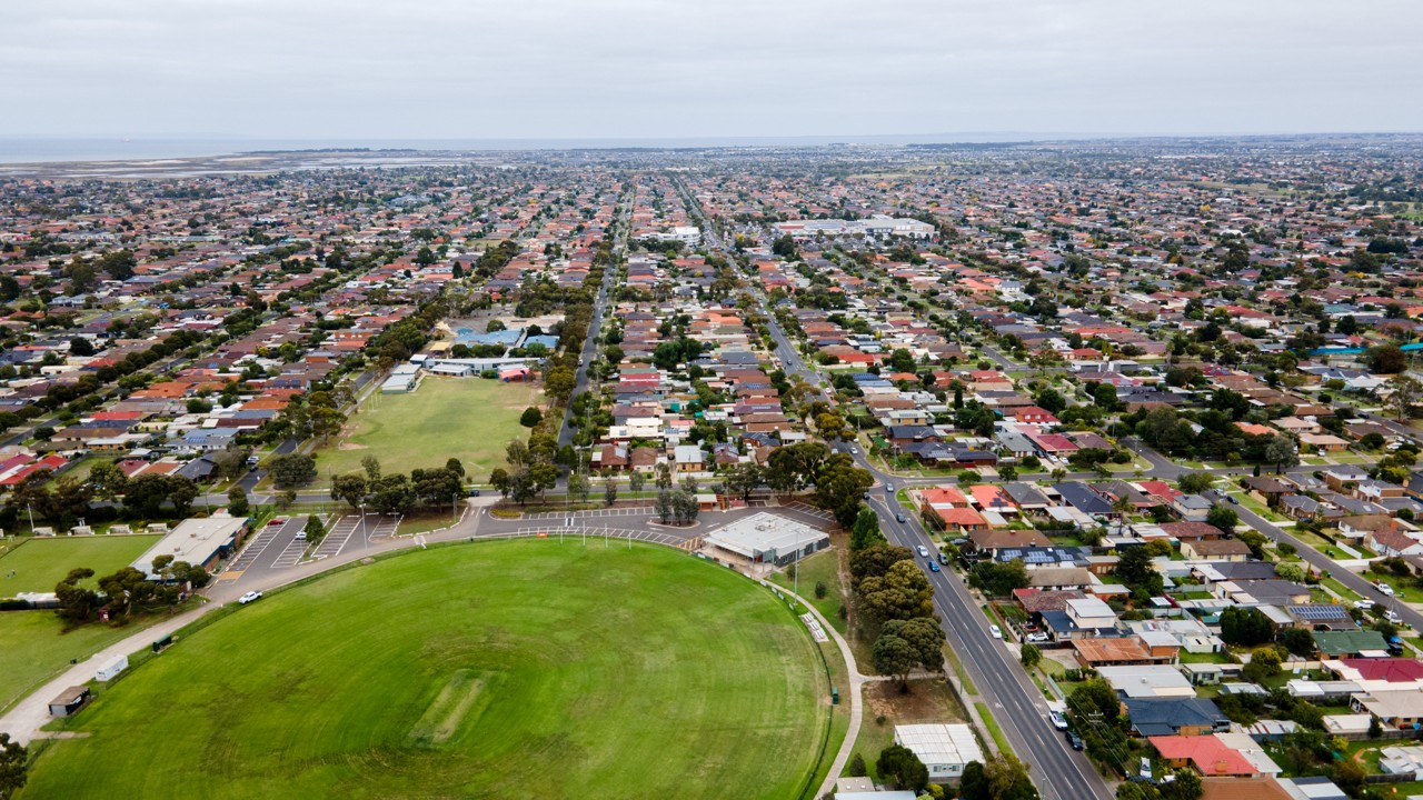 Altona Meadows, VIC, Aerial view of suburban houses and a sports field