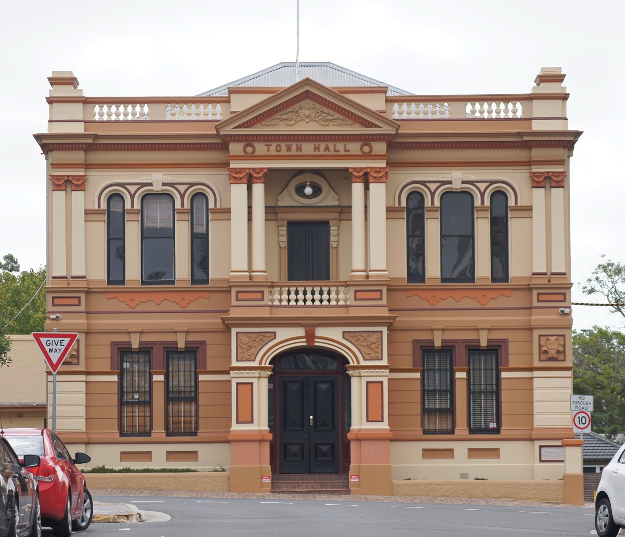 Granville, NSW, Historic town hall with columns and symmetry