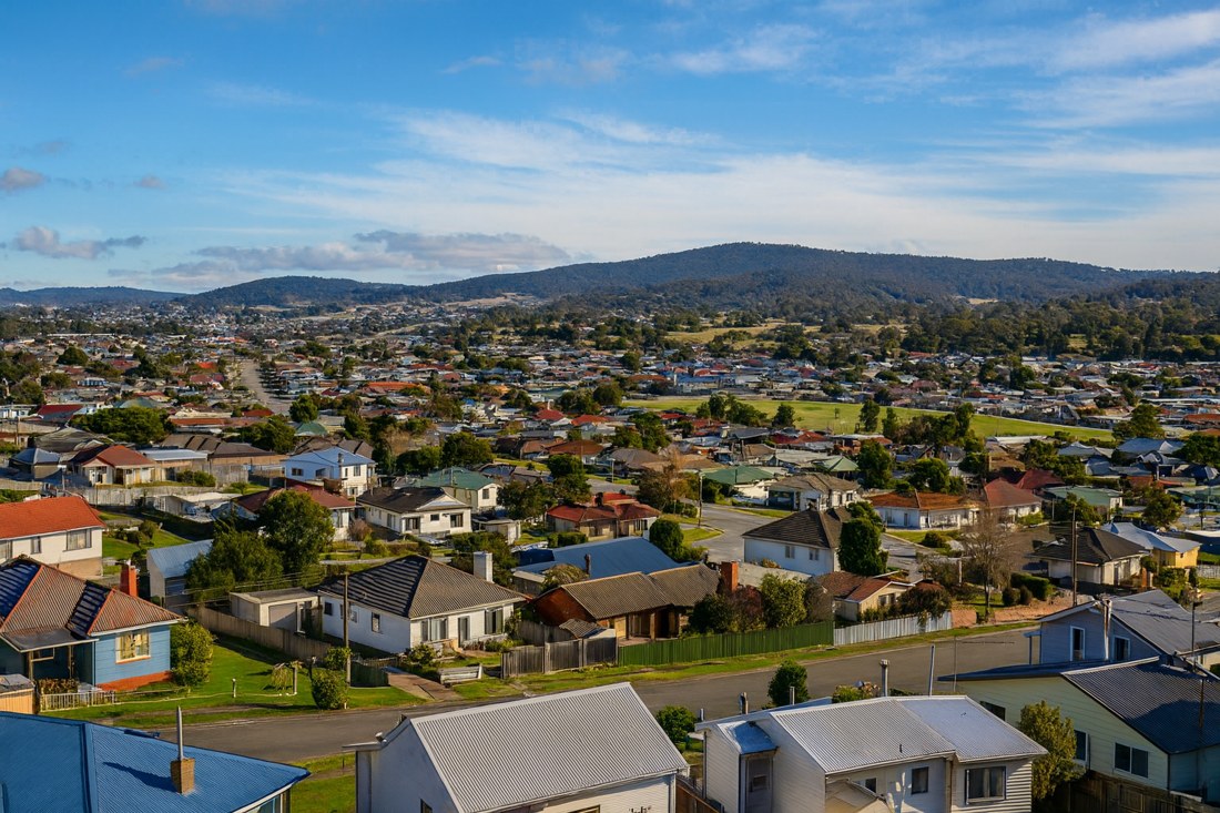Mayfield, NSW, Residential area with houses and distant hills