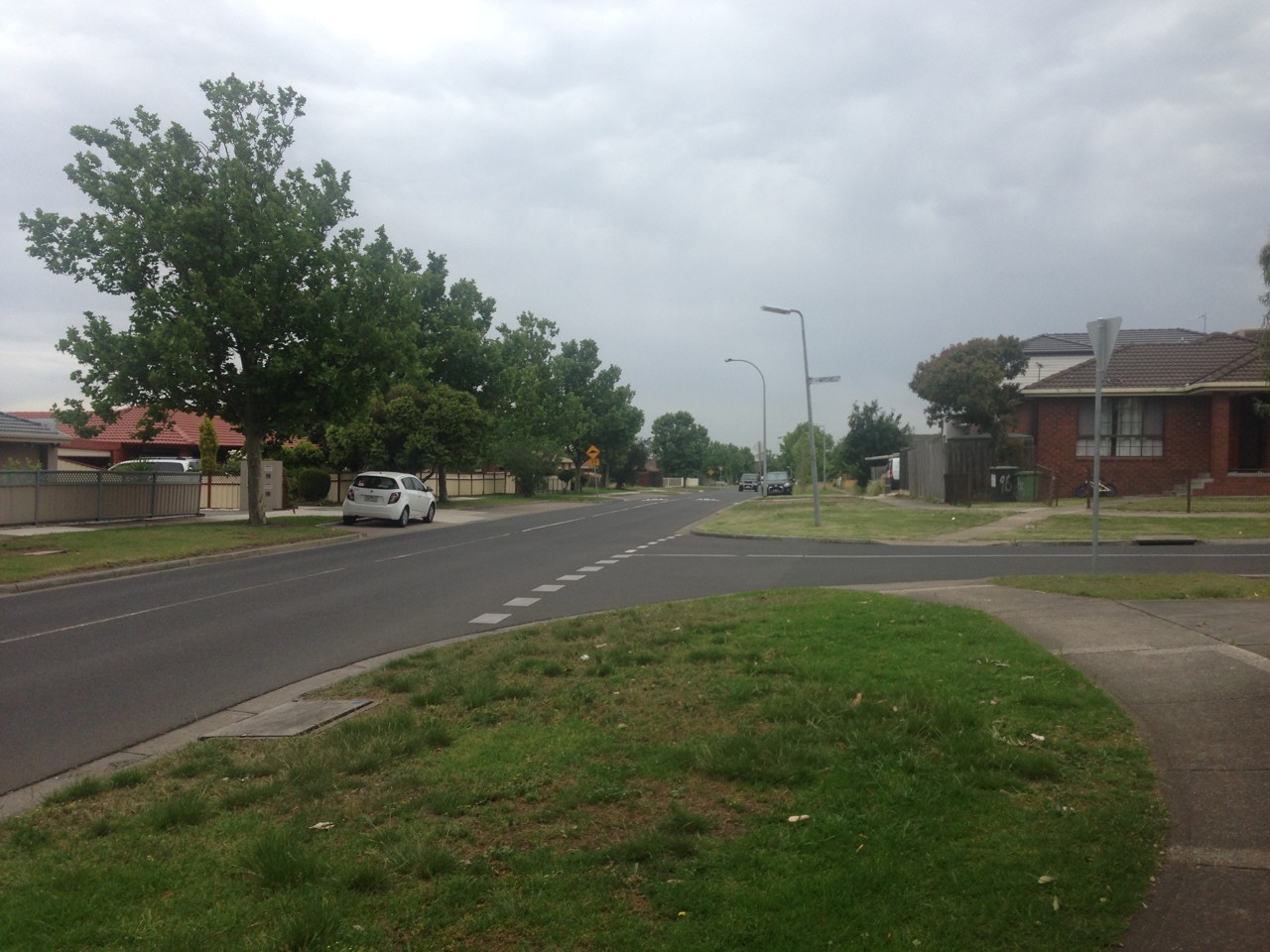 Meadow Heights, VIC, Residential street with houses and trees