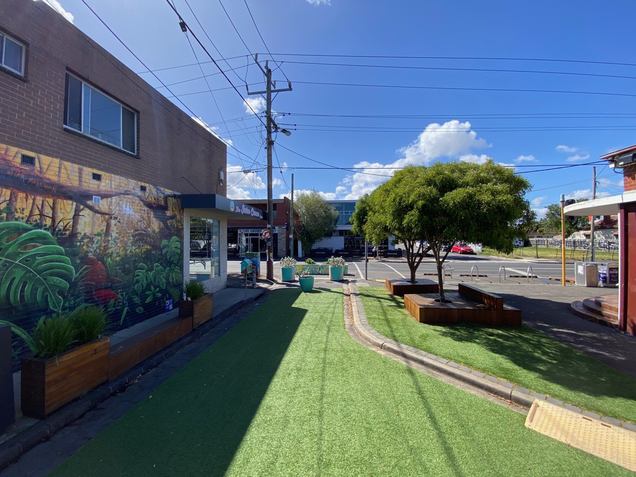West Footscray, VIC, Street mural and small park with seating area